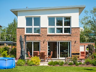 Massivhaus Haus Pultus von ROTH MASSIVHAUS Schlüsselfertig ab 365000€, Pultdachhaus Außenansicht 2