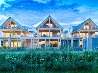 Fertighaus Mehrfamilienhaus Falchengraben von Bau-Fritz - Mehrfamilienhäuser Schlüsselfertig ab 3015000€, Außenansicht 3