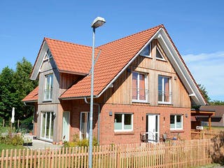 Fertighaus Alexandra (KfW-Effizienzhaus 40 EE) von Dammann-Haus Schlüsselfertig ab 360700€, Außenansicht 6