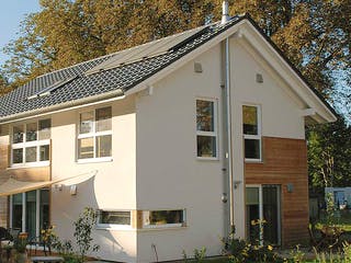 Fertighaus Anke (KfW-Effizienzhaus 40 EE) von Dammann-Haus Schlüsselfertig ab 381800€, Satteldach-Klassiker Außenansicht 4