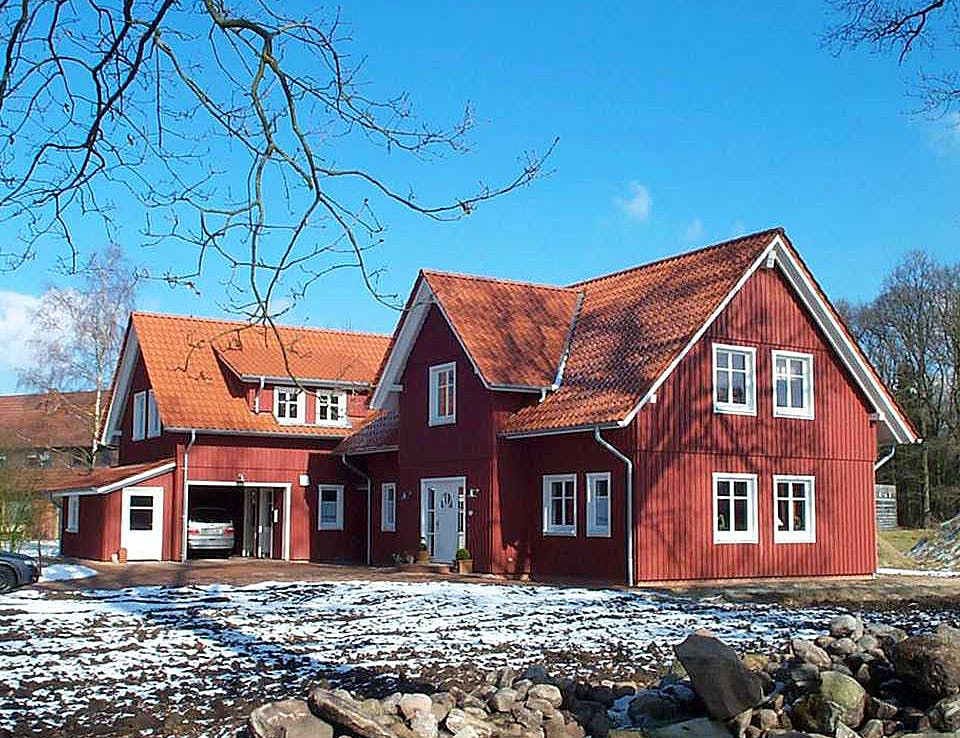 Fertighaus Heidi (KfW-Effizienzhaus 40 EE) von Dammann-Haus Schlüsselfertig ab 368100€, Satteldach-Klassiker Außenansicht 2