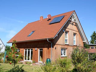 Fertighaus Imke (KfW-Effizienzhaus 40 EE) von Dammann-Haus Schlüsselfertig ab 323700€, Satteldach-Klassiker Außenansicht 3