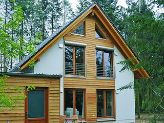 Fertighaus Isa (KfW-Effizienzhaus 40 EE) von Dammann-Haus Schlüsselfertig ab 297700€, Satteldach-Klassiker Außenansicht 2