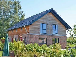 Fertighaus Julia 3 (KfW-Effizienzhaus 40 EE) von Dammann-Haus Schlüsselfertig ab 406500€, Satteldach-Klassiker Außenansicht 4