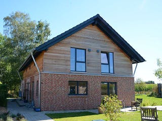 Fertighaus Jutta (KfW-Effizienzhaus 40 EE) von Dammann-Haus Schlüsselfertig ab 379200€, Satteldach-Klassiker Außenansicht 3