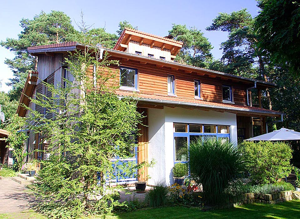 Fertighaus Margret (KfW-Effizienzhaus 40 EE) von Dammann-Haus Schlüsselfertig ab 508800€, Pultdachhaus Außenansicht 2