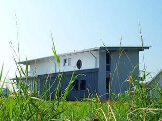 Fertighaus Sabine (KfW-Effizienzhaus 40 EE) von Dammann-Haus Schlüsselfertig ab 444200€, Pultdachhaus Außenansicht 6