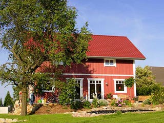 Fertighaus Svantje (KfW-Effizienzhaus 40 EE) von Dammann-Haus Schlüsselfertig ab 350500€, Satteldach-Klassiker Außenansicht 4