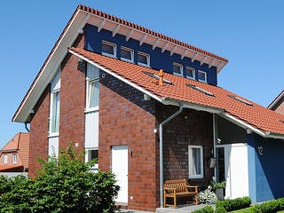 Fertighaus Yvonne (KfW-Effizienzhaus 40 EE) von Dammann-Haus Schlüsselfertig ab 368400€, Pultdachhaus Außenansicht 1