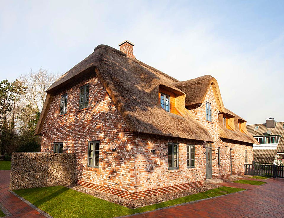 Massivhaus MFH 1.5 - 270 von Dan Concept Massivhaus, Satteldach-Klassiker Außenansicht 1