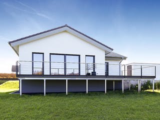 Massivhaus ICON Winkelbungalow von Dennert Massivhaus Ausbauhaus ab 266800€, Bungalow Außenansicht 1
