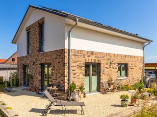 Massivhaus Scheunenhaus 130 von ECO System HAUS Schlüsselfertig ab 310900€, Satteldach-Klassiker Außenansicht 1