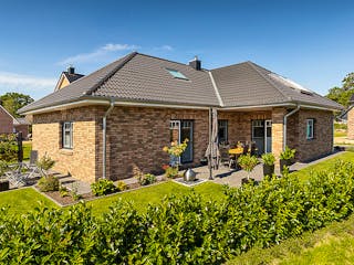 Massivhaus Winkelbungalow 135 von ECO System HAUS, Bungalow Außenansicht 1
