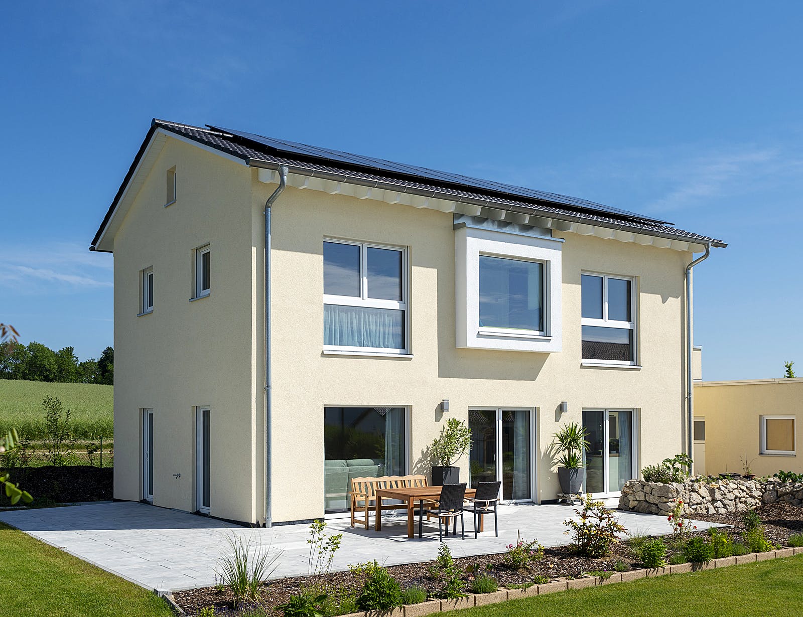 Fertighaus Modern 154 von FischerHaus Schlüsselfertig ab 443494€, Satteldach-Klassiker Außenansicht 2
