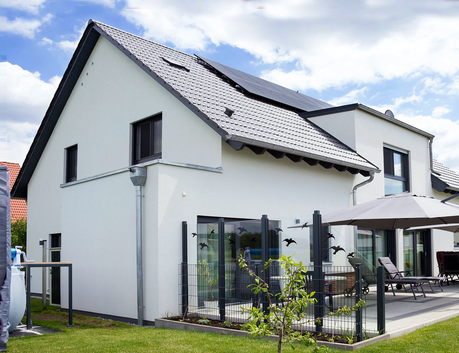 Fertighaus Modern 234 von FischerHaus Schlüsselfertig ab 659635€, Satteldach-Klassiker Außenansicht 2