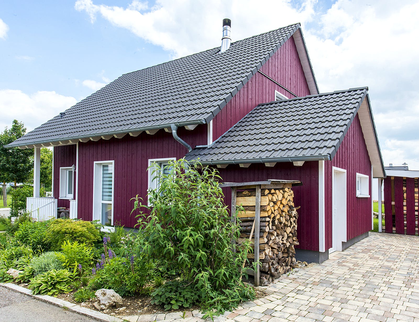 Fertighaus F108 - Gosmann von Fluck Holzbau Schlüsselfertig ab 380000€, Satteldach-Klassiker Außenansicht 2