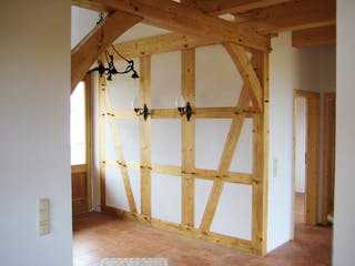 Fertighaus Ostsee von Fuhrberger Zimmerei Betriebsges. mbH, Fachwerk Außenansicht 12