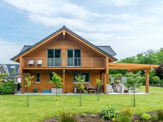 Blockhaus Münsterland von Fullwood Wohnblockhaus Ausbauhaus ab 260000€, Blockhaus Außenansicht 3