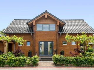 Blockhaus Münsterland von Fullwood Wohnblockhaus Ausbauhaus ab 260000€, Blockhaus Außenansicht 5