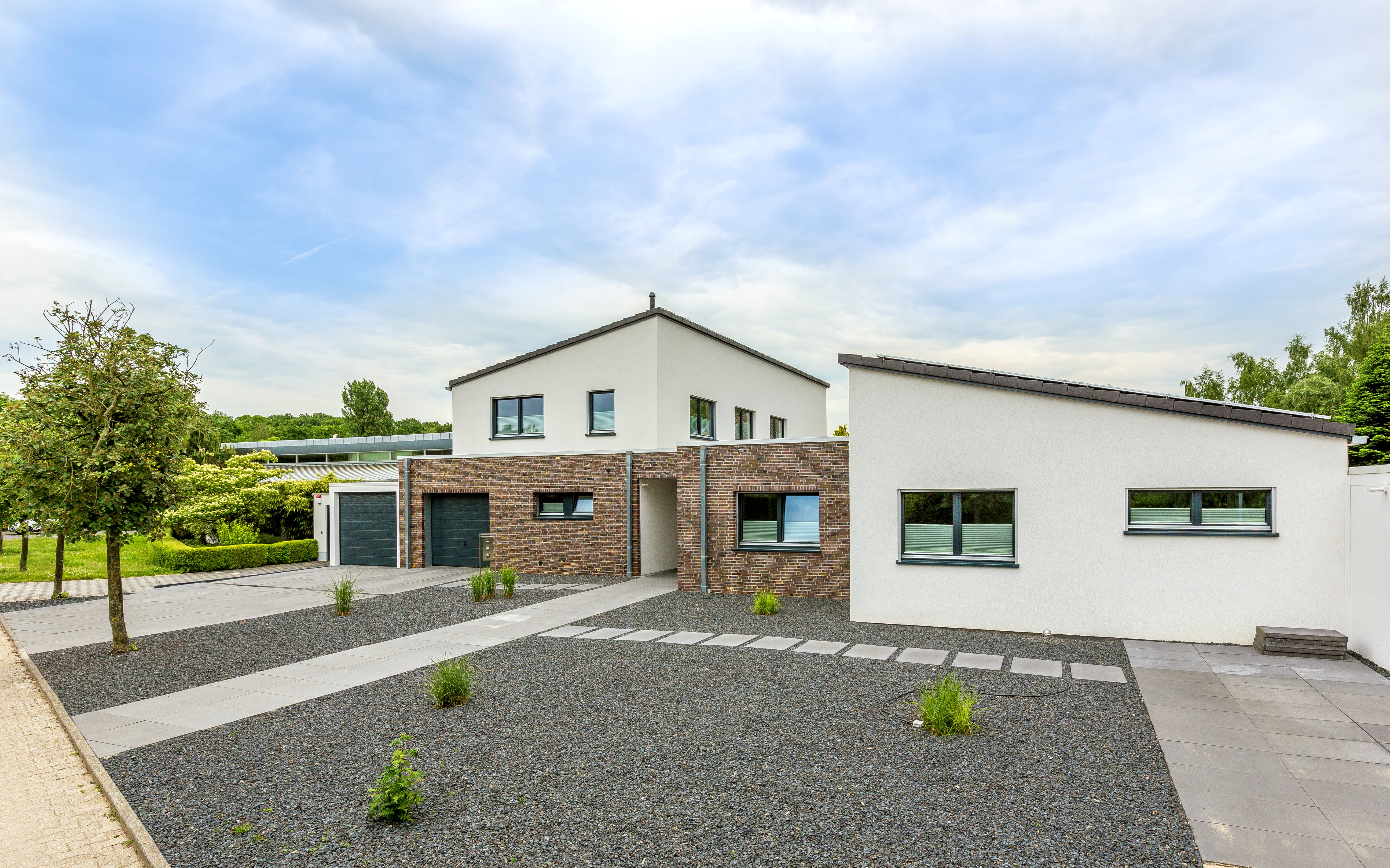 Fertighaus Generationenhaus von Meisterstück-HAUS, Pultdachhaus Außenansicht 3