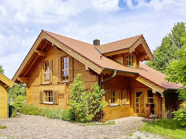 Blockhaus Görwihl von Rems-Murr-Holzhaus Ausbauhaus ab 344710€, Satteldach-Klassiker Außenansicht 1 Blockhaus Görwihl von Rems-Murr-Holzhaus Ausbauhaus ab 344710€, Satteldach-Klassiker Außenansicht 1