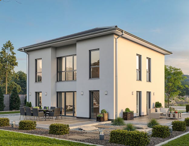 Stadtvilla als Fertig-Massivhaus von hebelHAUS mit vorgefertigten Systemwandelementen aus Porenbeton & Massivdach aus Porenbetonplatten: Durch die Vorproduktion ist der Rohbau innerhalb weniger Tage komplett – statt wie in mehreren Monaten wie bei der herkömmlichen Stein-auf-Stein Bauweise.