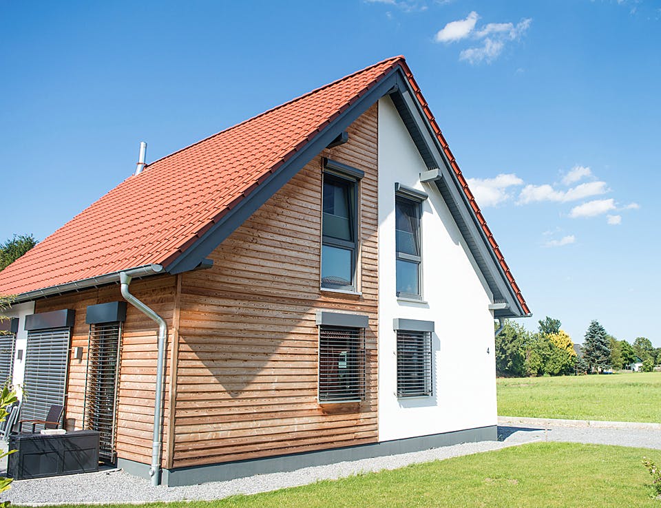 Fertighaus Kompaktes Einfamilienhaus für Kostenbewusste von Hausbau Heggemann Schlüsselfertig ab 350000€, Außenansicht 2