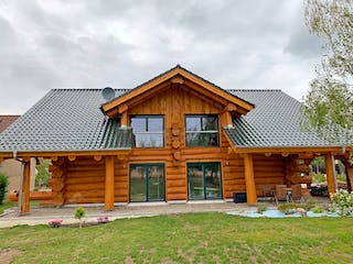 Blockhaus Blockhaus Uckermark von Holzbau rustikal - Blockhäuser Bausatzhaus ab 243318€, Blockhaus Außenansicht 1