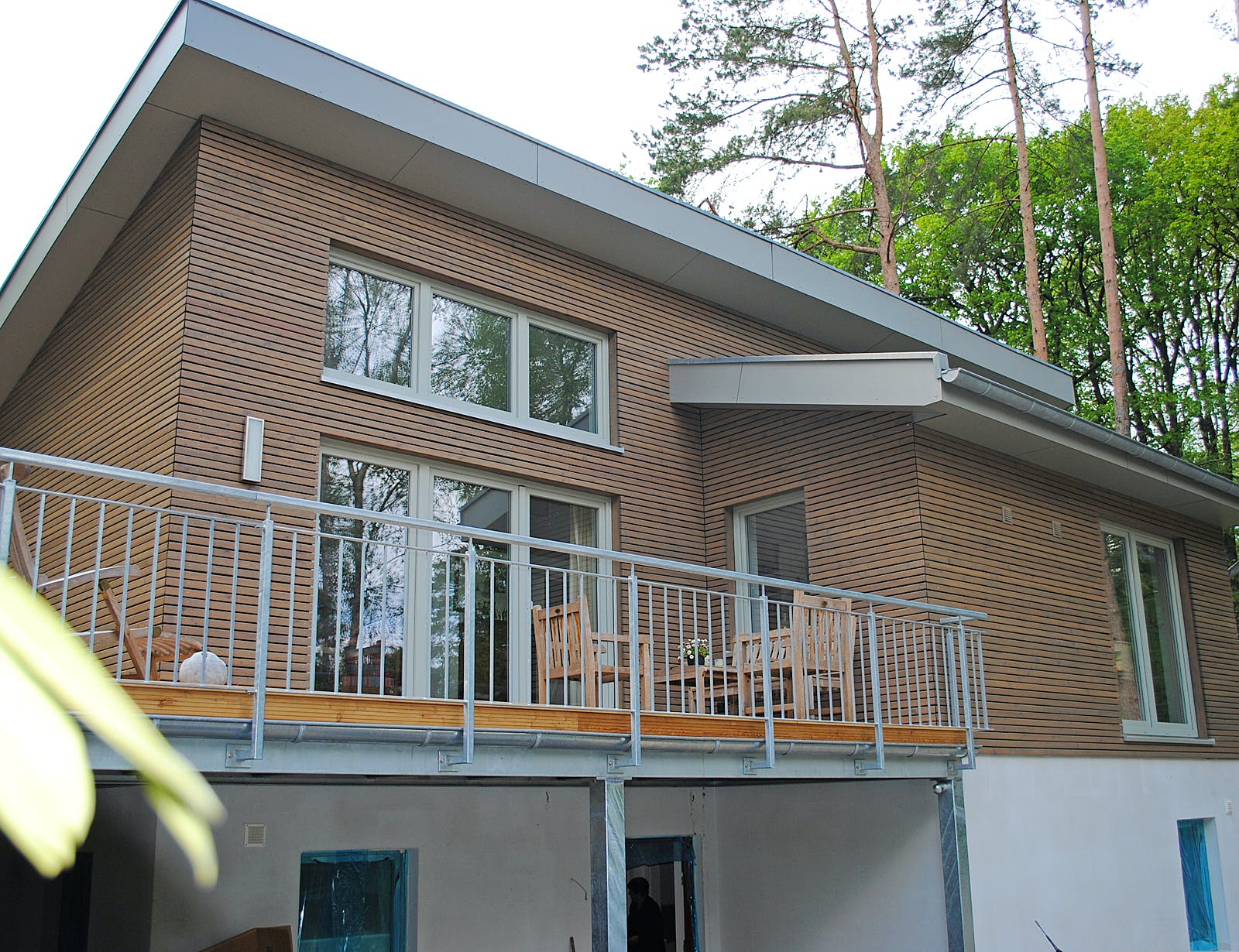 Fertighaus Johnsen - Haus 1 von Johnsen Zimmerei & Hausbau Schlüsselfertig ab 349000€, Pultdachhaus Außenansicht 2