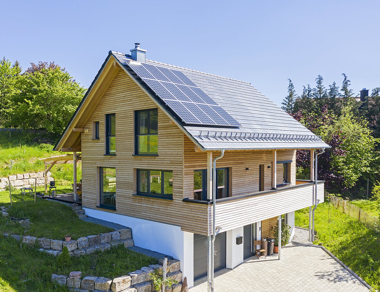 Fertighaus Einfamilienhaus H von Zimmergeschäft Kunz Schlüsselfertig ab 650000€, Satteldach-Klassiker Außenansicht 1