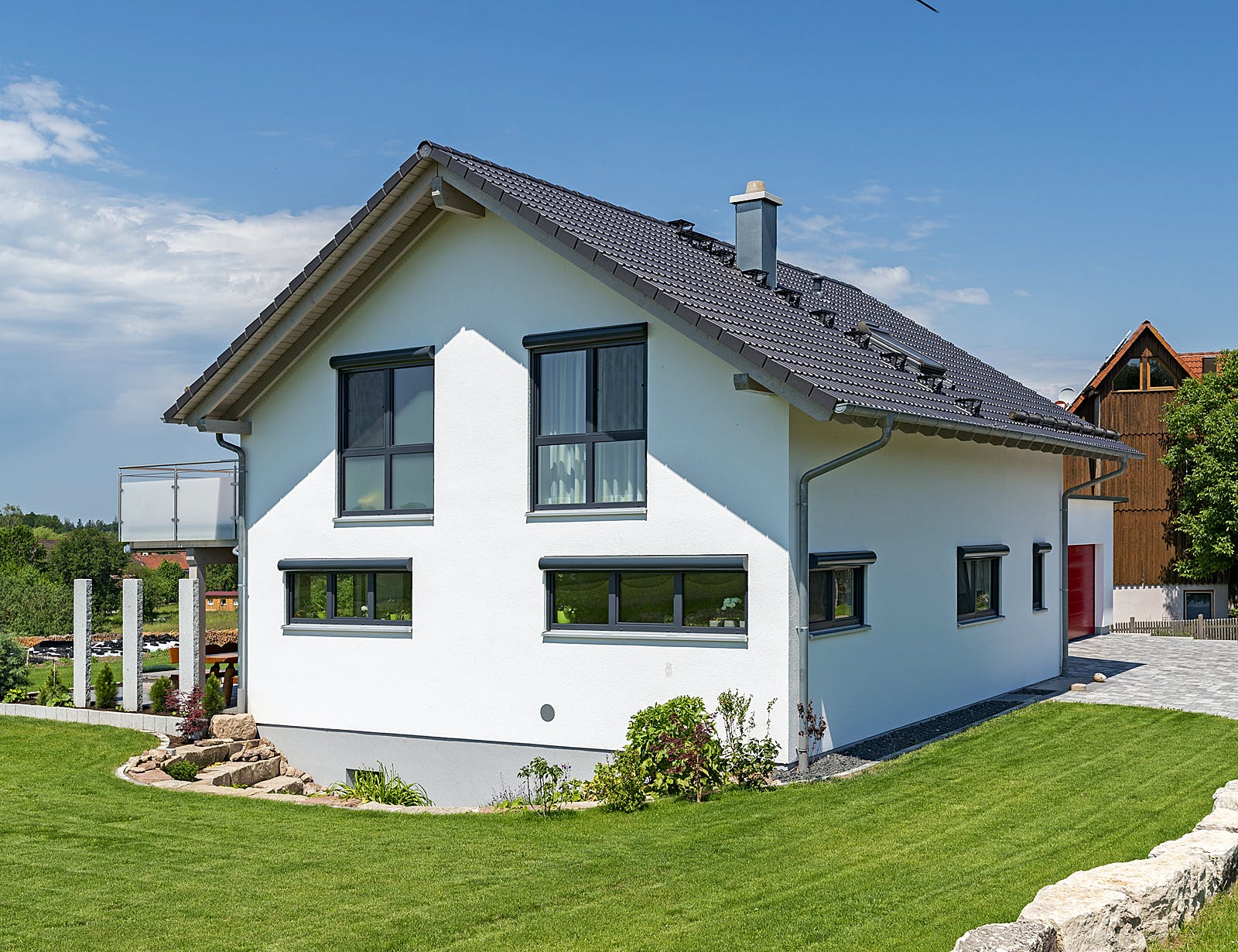 Fertighaus Einfamilienhaus R von Zimmergeschäft Kunz Schlüsselfertig ab 650000€, Satteldach-Klassiker Außenansicht 2