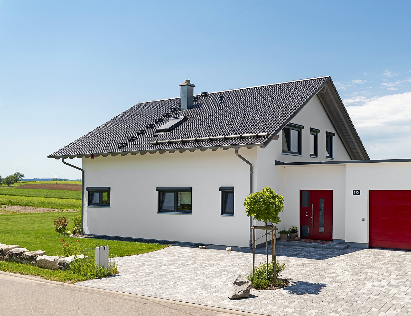 Fertighaus Einfamilienhaus R von Zimmergeschäft Kunz Schlüsselfertig ab 650000€, Satteldach-Klassiker Außenansicht 3