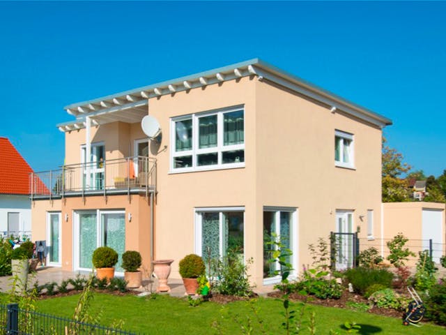 Massivhaus Großzügiges Pultdachhaus von RheinMassiv Massivhäuser, Pultdachhaus Außenansicht 1