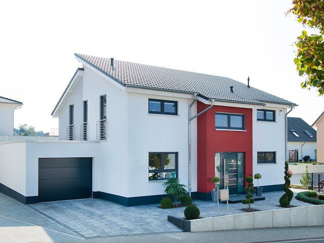 Massivhaus Großartiger Wohnkomfort von RheinMassiv Massivhäuser, Pultdachhaus Außenansicht 1
