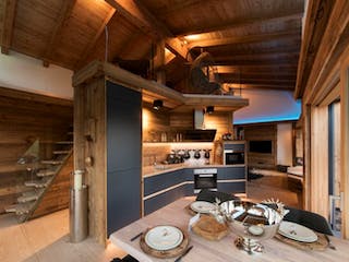 Blockhaus Chalet Tirolia von TIROLIA, Bungalow Innenansicht 1