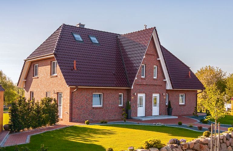 Massivhaus Duo Friesenhaus 130 von ECO System HAUS, Außenansicht 1