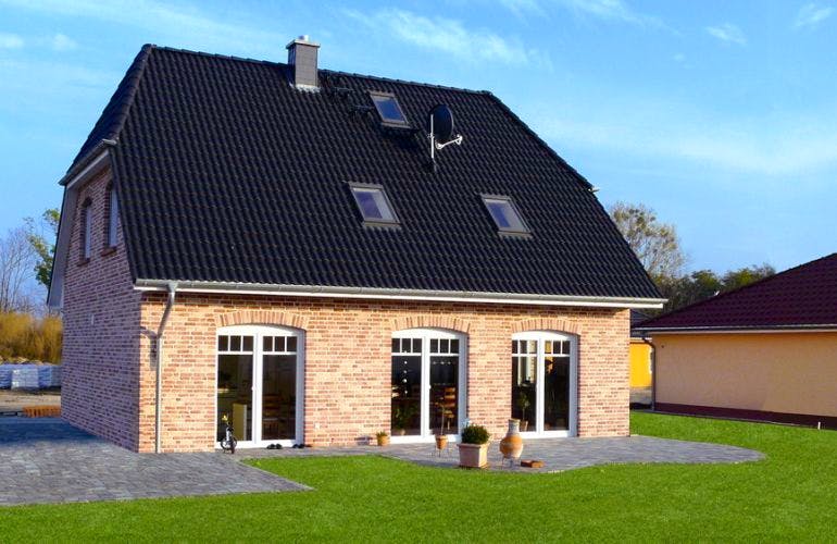 Massivhaus Landhaus Friesland von EWA Hausbau Schlüsselfertig ab 248990€, Außenansicht 1