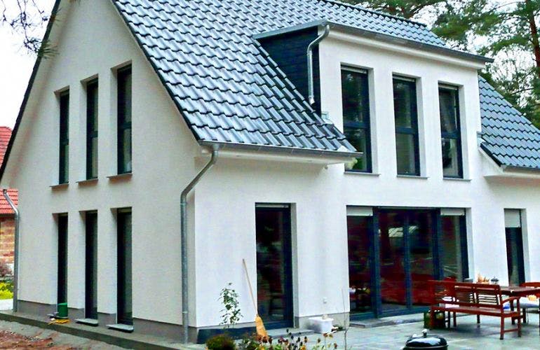 Massivhaus Landhaus Schönwalde von EWA Hausbau Schlüsselfertig ab 249990€,  Außenansicht 1