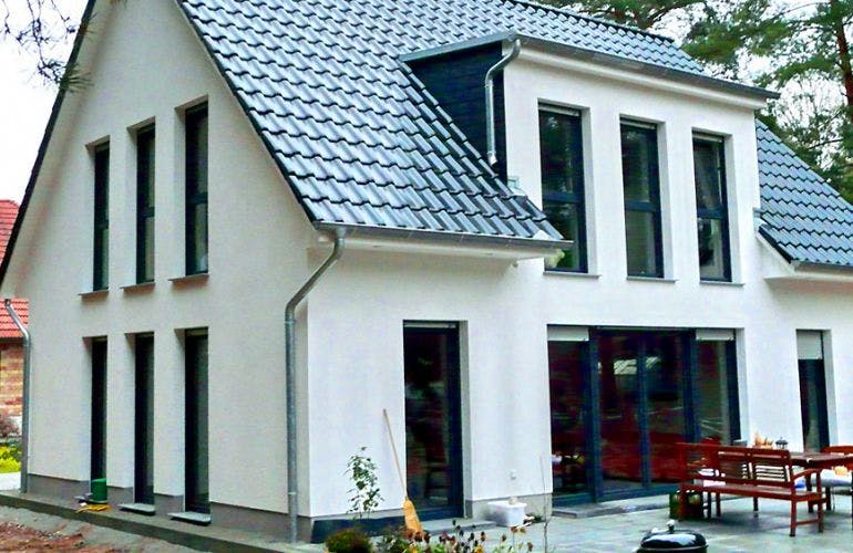 Massivhaus Landhaus Schönwalde von EWA Hausbau Schlüsselfertig ab 249990€, Außenansicht 1