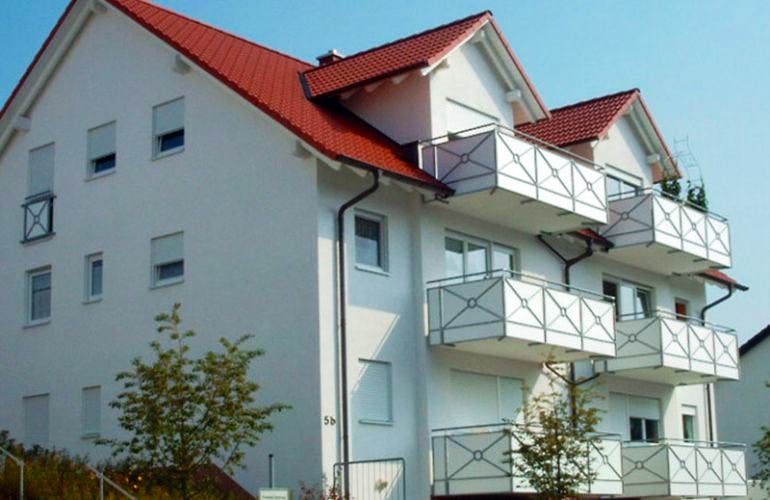Massivhaus Mehrfamilienhaus Frankfurt von Immobilien Atelier Klaus Reuter, Außenansicht 1