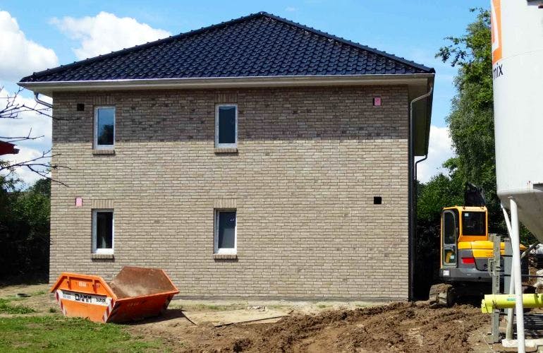 Massivhaus Mehrfamilienhaus Reinfeld von Hausbauplanung Nord, Außenansicht 1
