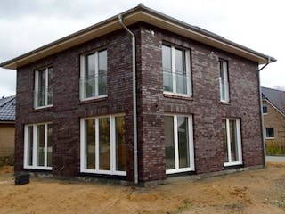 Massivhaus Stadtvilla Oelixdorf von Hausbauplanung Nord, Stadtvilla Außenansicht 1