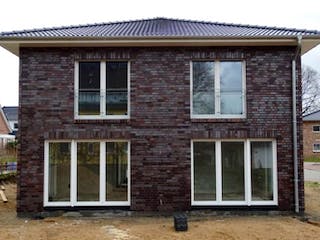 Massivhaus Stadtvilla Oelixdorf von Hausbauplanung Nord, Stadtvilla Außenansicht 2