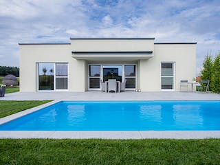 Massivhaus WimbergerHaus Kundenhaus Starker von Wimberger Bau, Bungalow Außenansicht 2