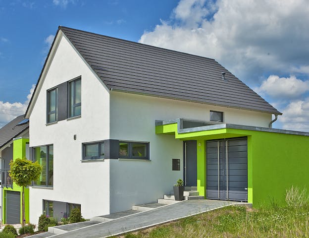 Massivhaus Thiel mit Keller & Garage von Plan-Concept Massivhaus