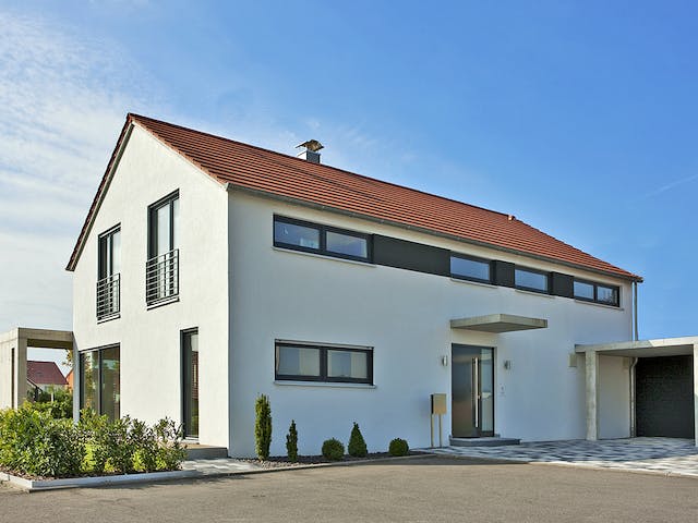 Massivhaus Zöllner von Plan-Concept Massivhaus, Satteldach-Klassiker Außenansicht 2