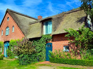 Massivhaus mit Reetdach