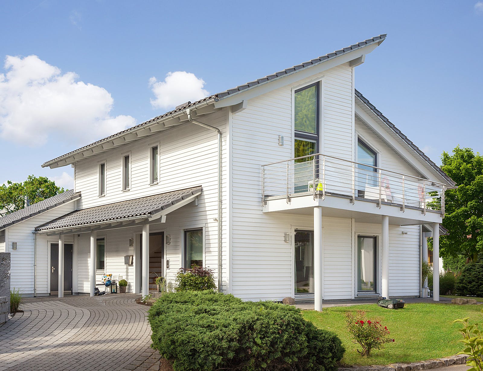 Fertighaus E 15-146.3 - Young Family Home 1 von SchwörerHaus Schlüsselfertig ab 494600€, Pultdachhaus Außenansicht 1