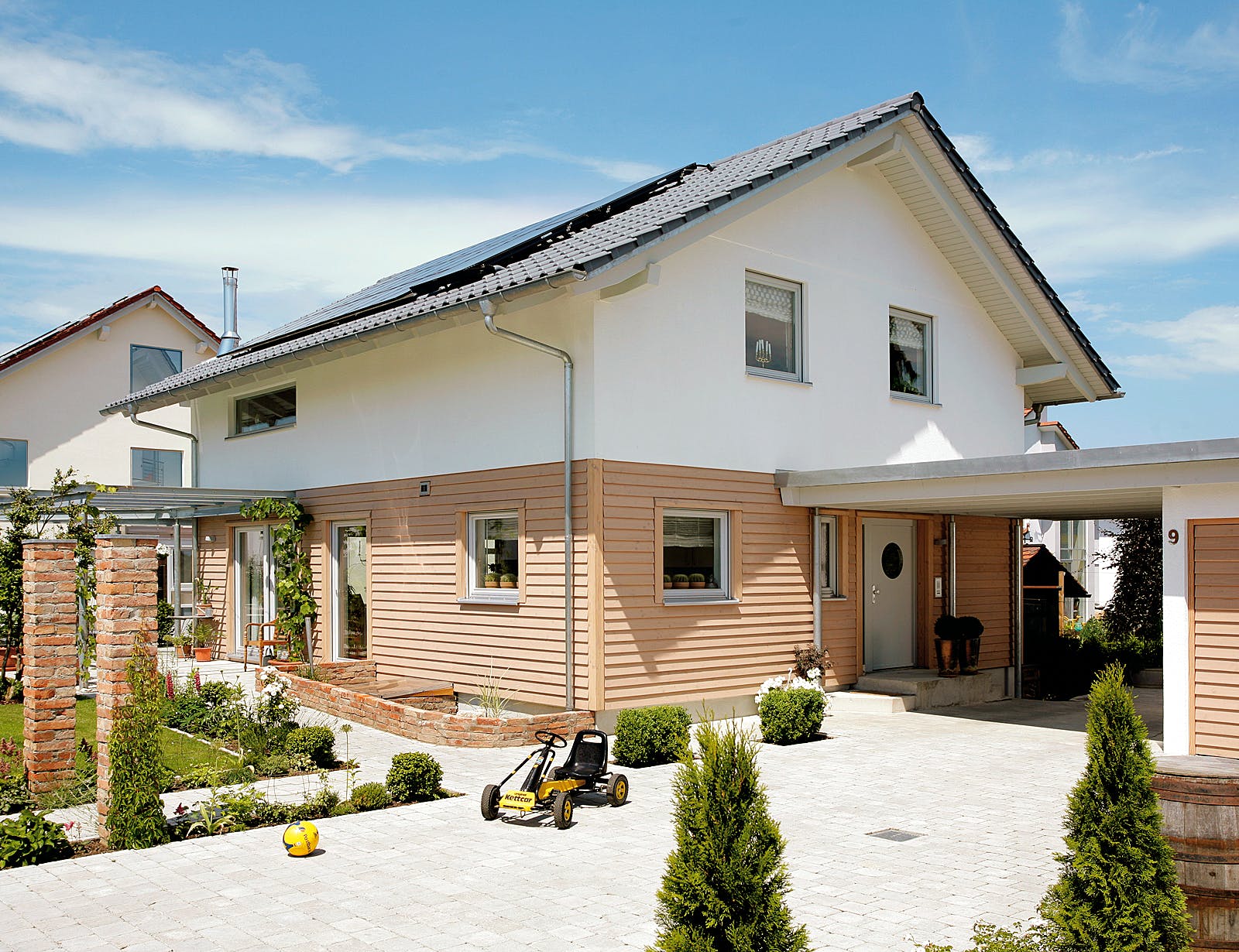 Fertighaus E 15-147.3 - Einfamilienhaus mit Terrasse von SchwörerHaus Schlüsselfertig ab 350350€, Außenansicht 1