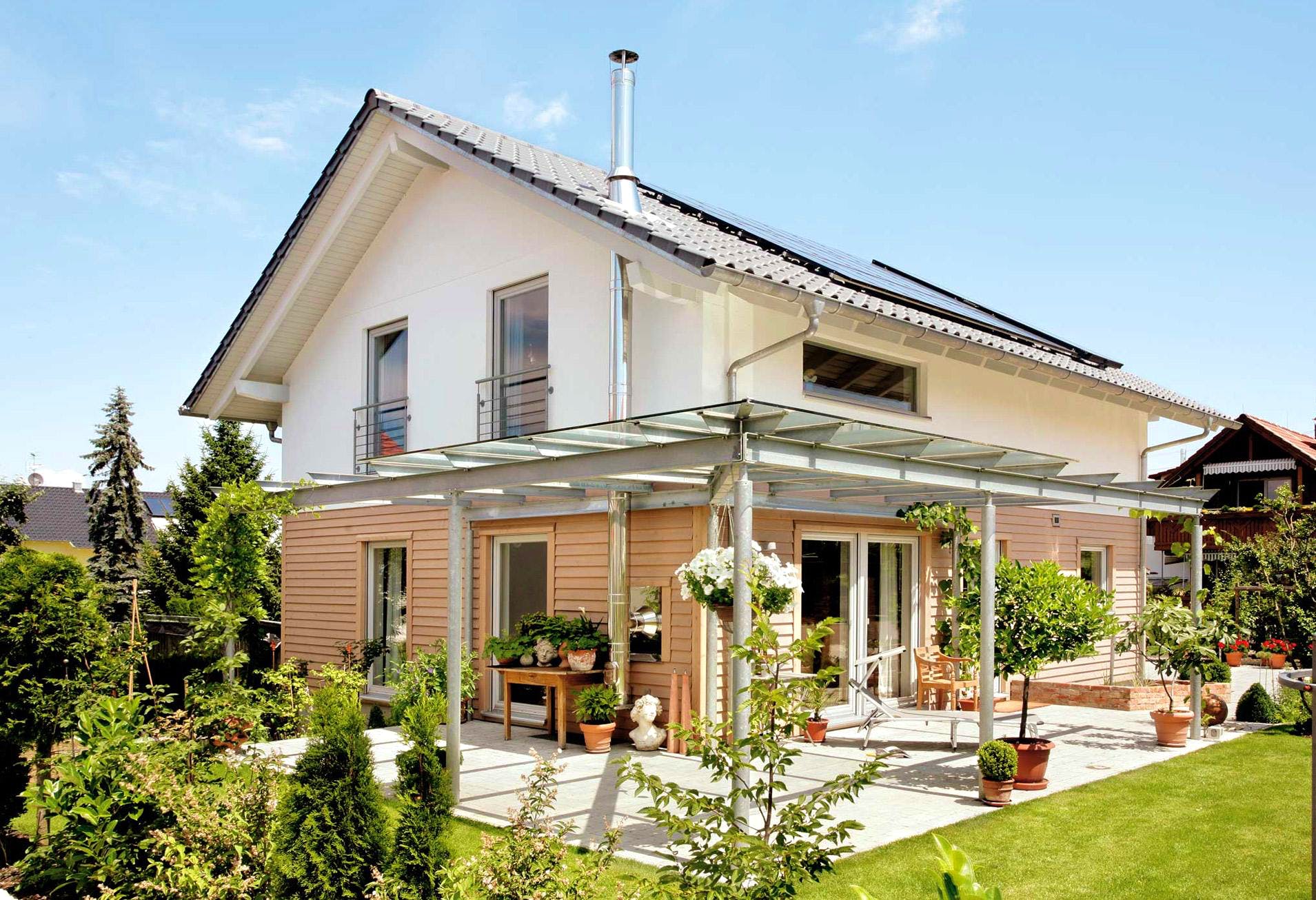 Fertighaus E 15-147.3 - Einfamilienhaus mit Terrasse von SchwörerHaus Schlüsselfertig ab 350350€, Außenansicht 2